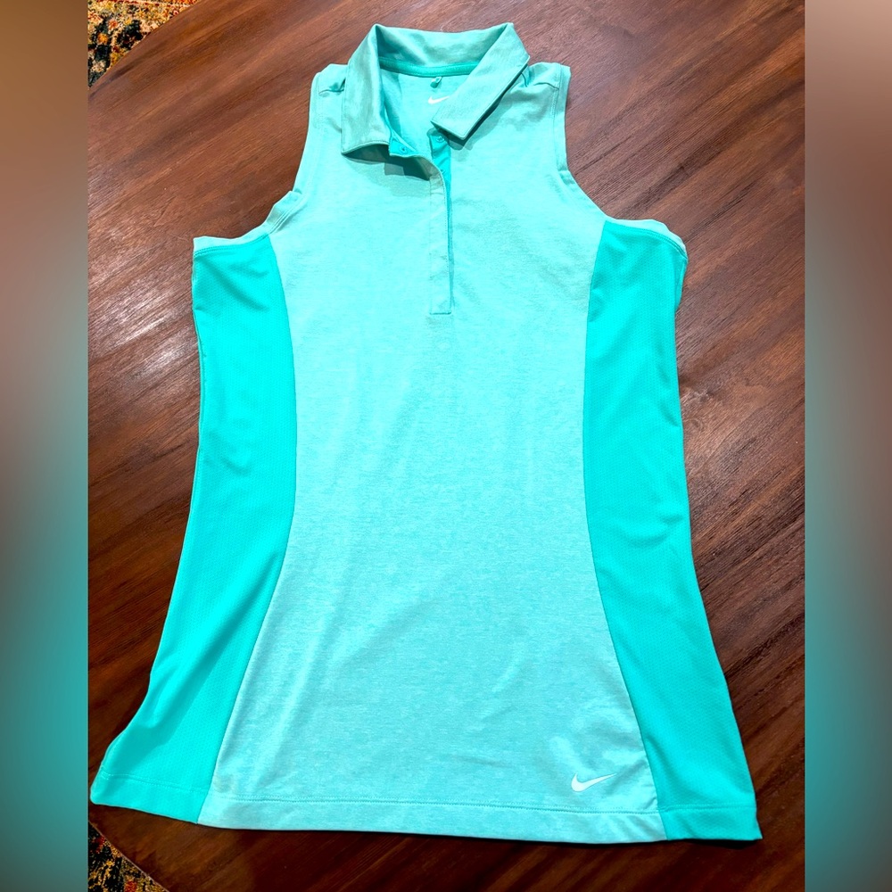Women’s medium tall collared sleeveless golf shirt. Mint green